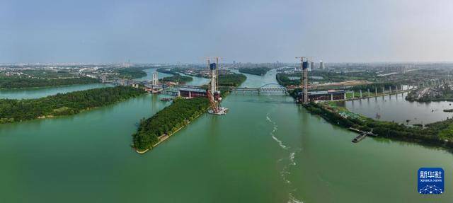皇冠信用網哪里申请_江苏扬州:沪渝蓉高铁跨京杭运河斜拉桥建设有序推进